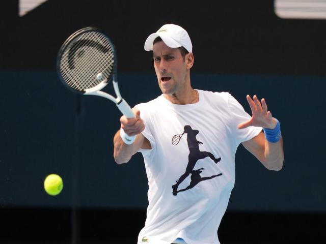 Djokovic back into swing in Australia, visa questions linger